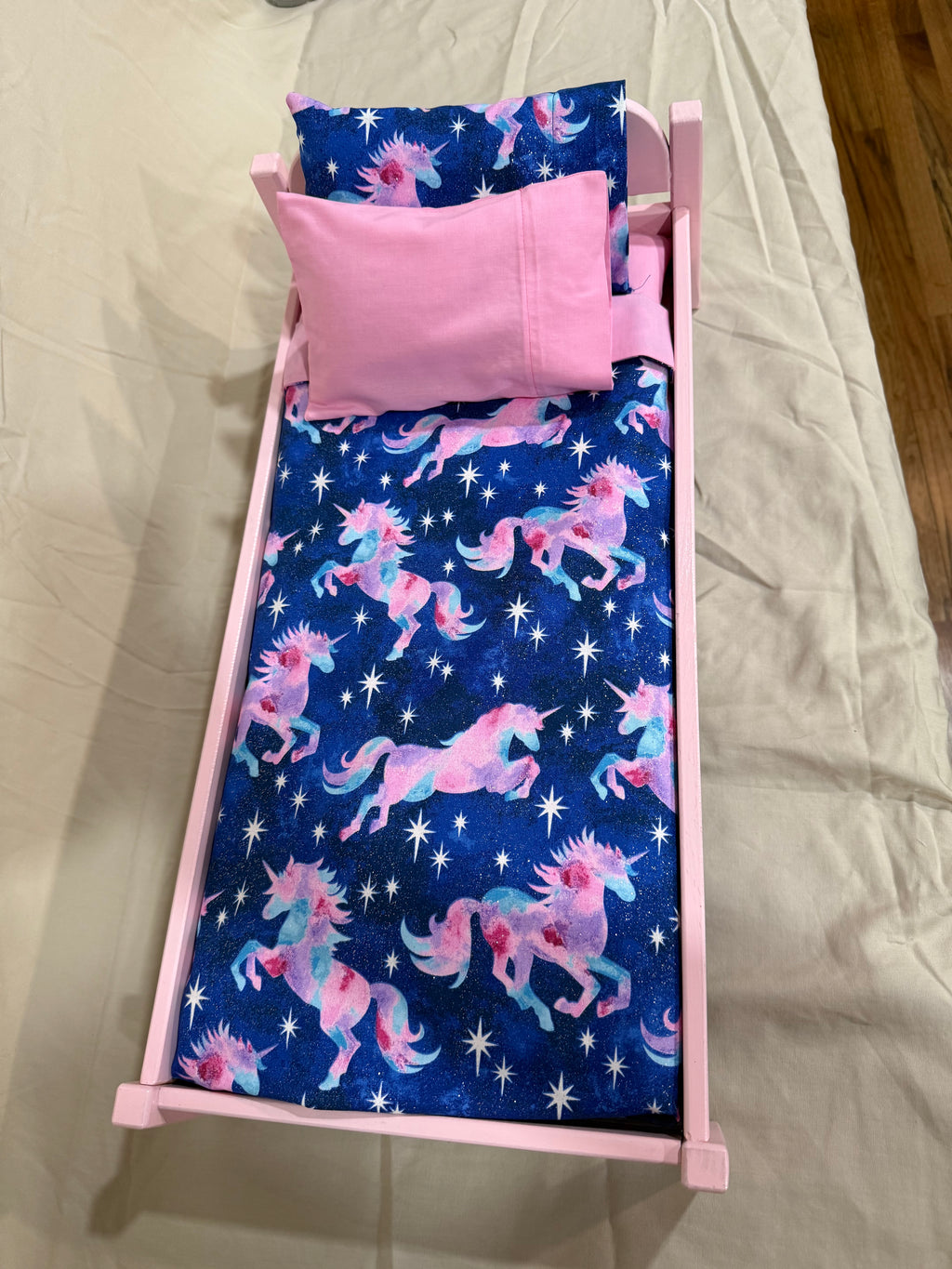 Barbie bed in blue unicorn bedding