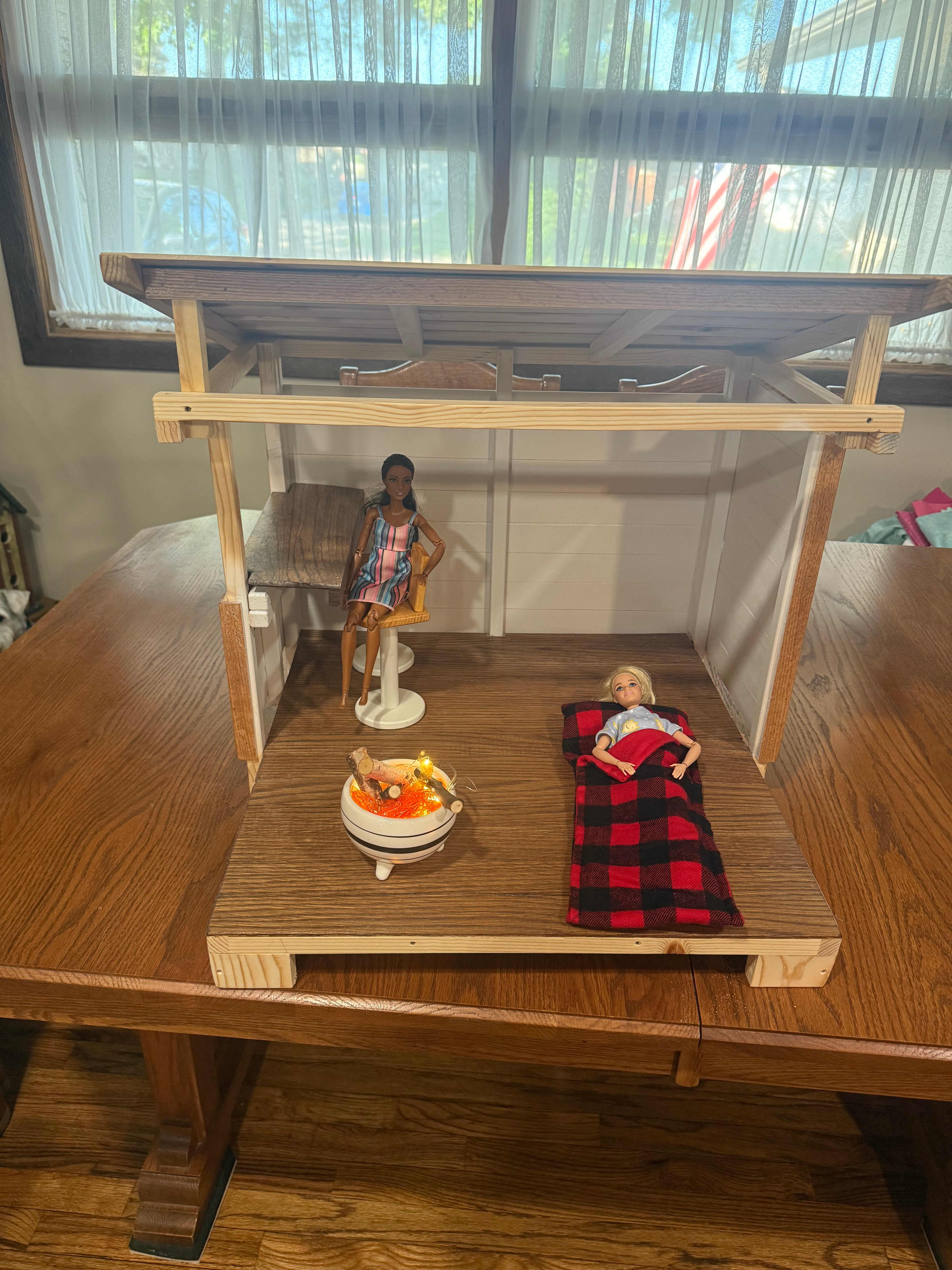 Barbie cabana includes fire pit, 2 bar stools, and 1 sleeping bag (dolls not included)