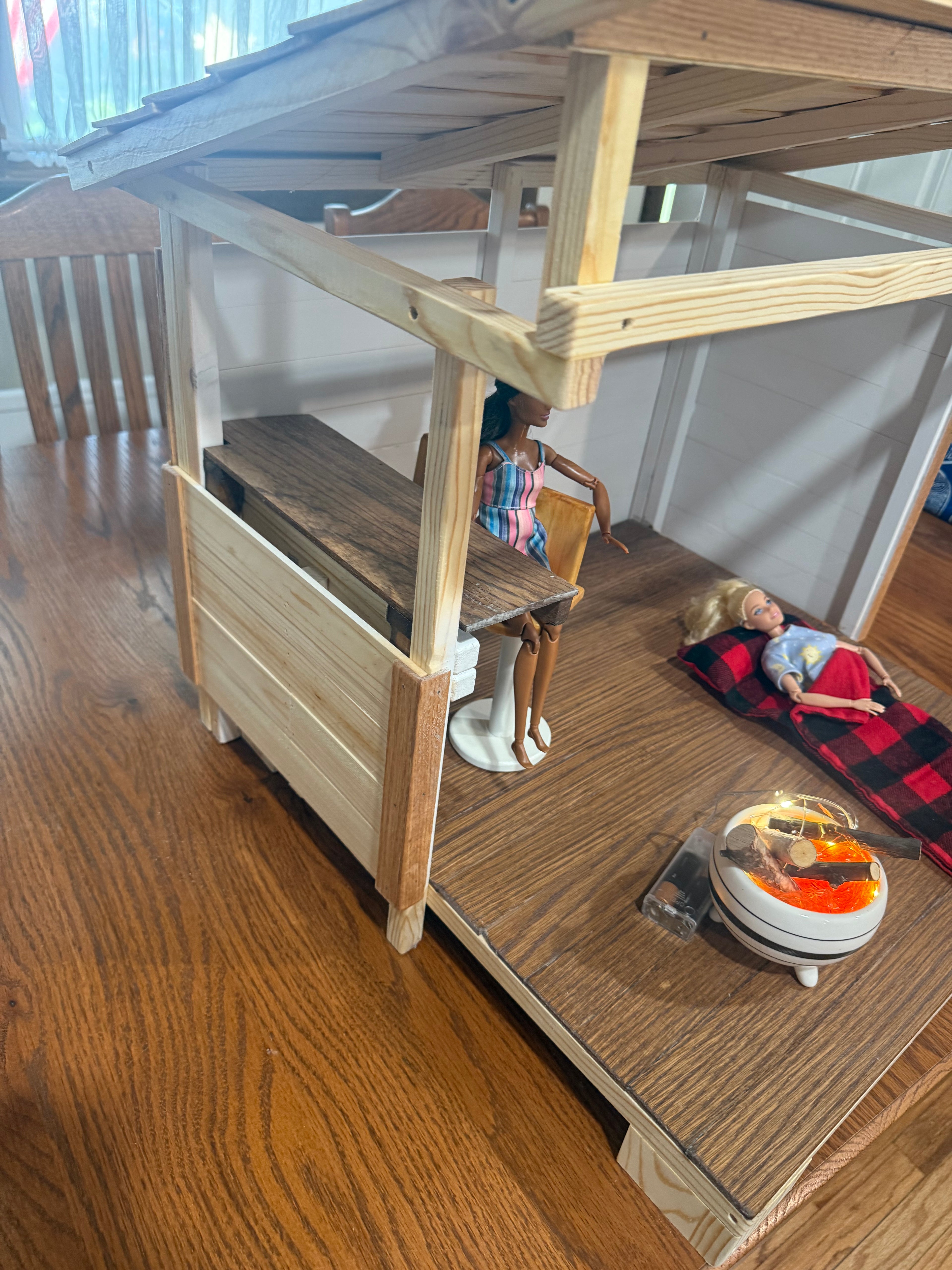 Barbie cabana includes fire pit, 2 bar stools, and 1 sleeping bag (dolls not included)
