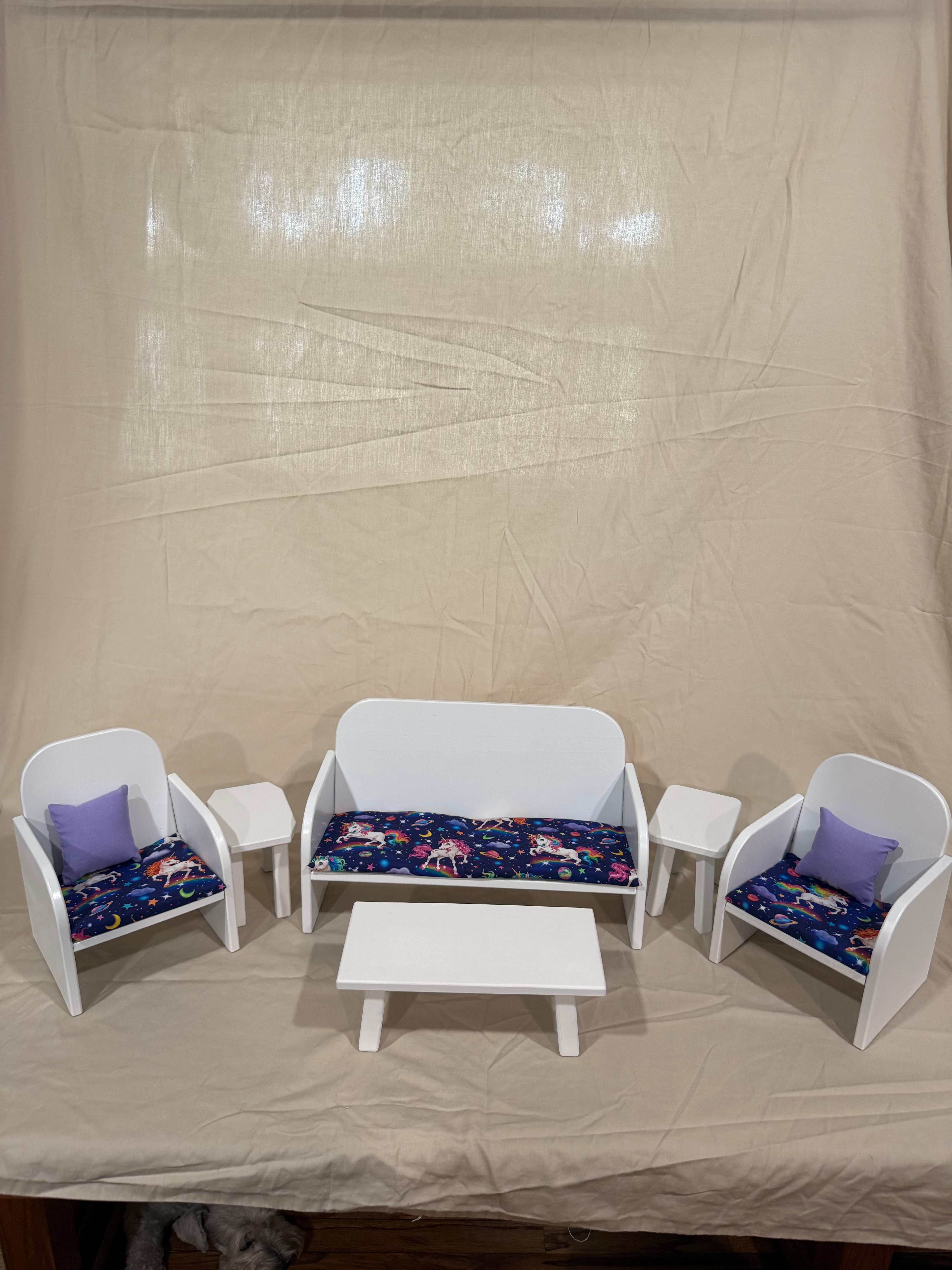 Barbie couch, chairs, and tables in multicolor unicorn