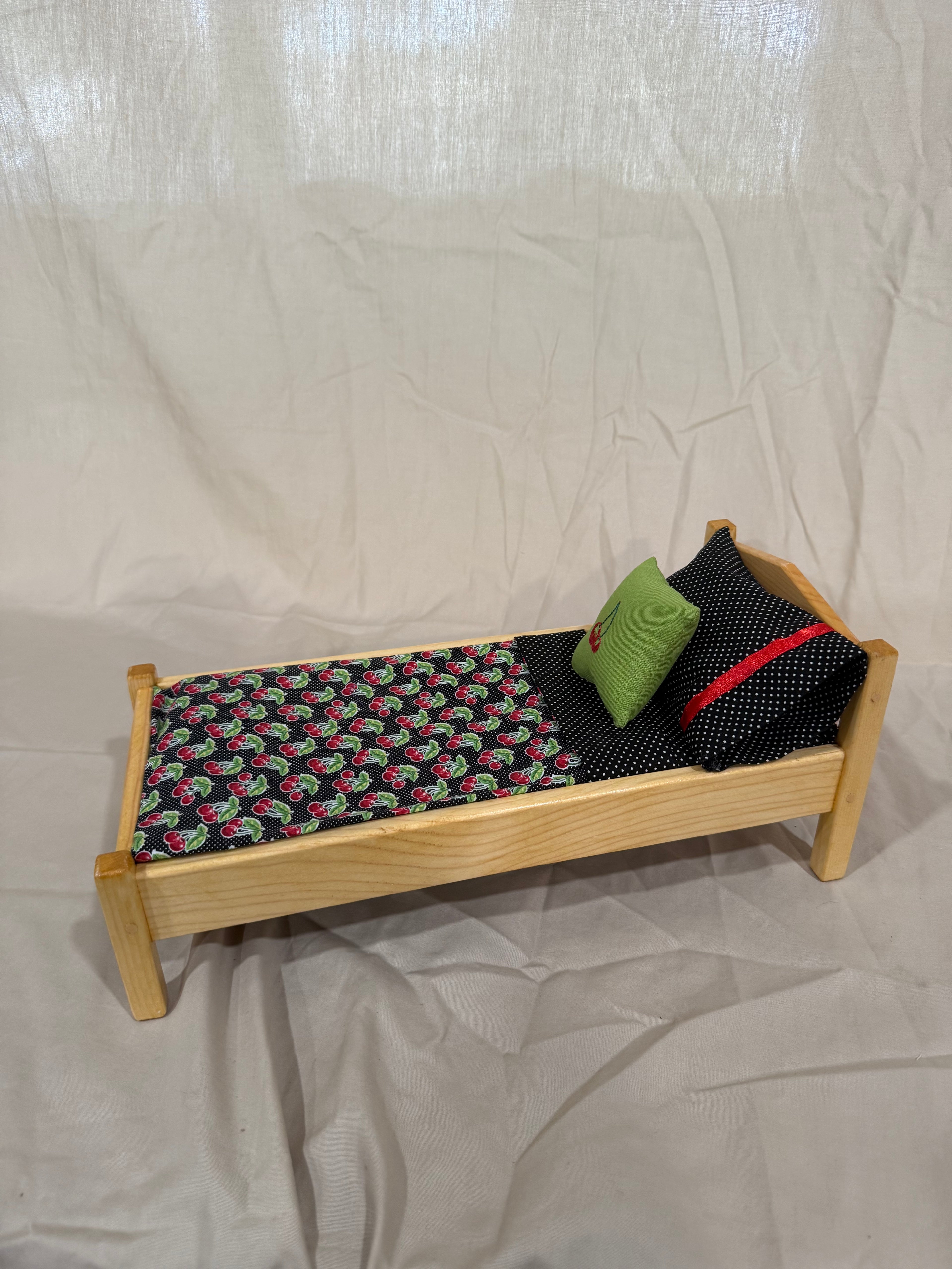 Barbie bed in cherry bedding